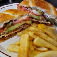 Torta Mexicana · Mexican Sandwich with choice of meat, beans, mayo, grilled cheese, poblano pepper, lettuce, ...