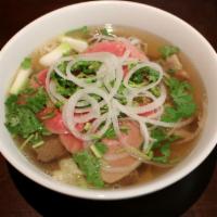 20. Pho Dac Biet · Special pho with rare steak well-done flank, fat brisket, tendon, and tripe.