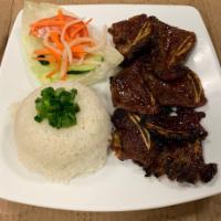 50. Com Tam Bo Nuong · Broken rice with grilled beef short rib.