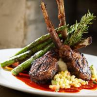 Rack of Lamb · Herb & Chile grilled rack of lamb over Yukon Gold mashed potatoes with a New Mexico Red Chil...