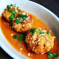Agave Meatballs · Homemade veal, chorizo, and hatch green Chile meatballs in a New Mexico red Chile gravy with...