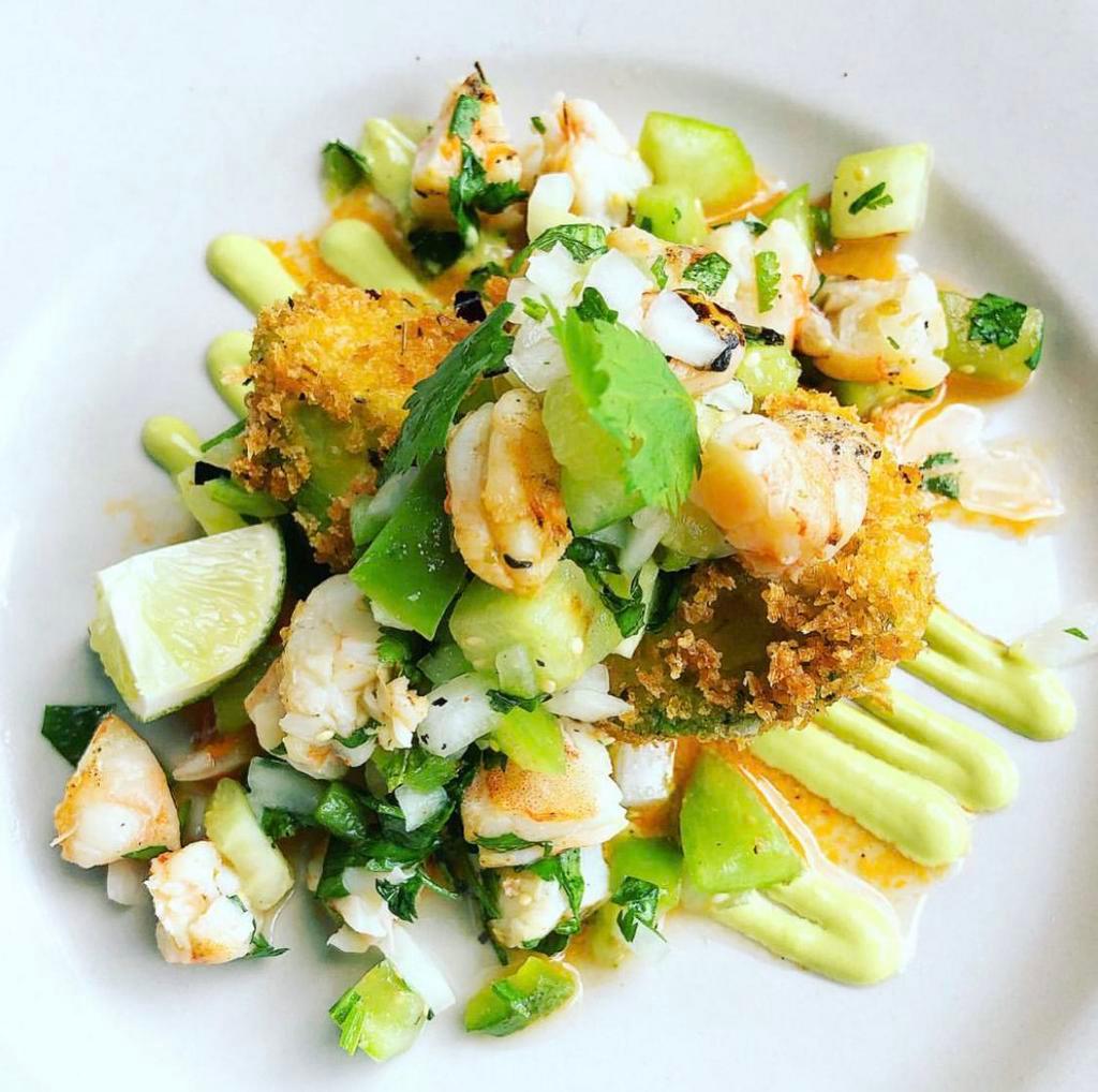 Shrimp Ceviche and Fried Avocado · Chopped gulf shrimp marinated in lime, oil, serranos, tomatillos, and cider vinegar, served over a crispy fried avocado, with fire roasted rojo and Verde sauces.