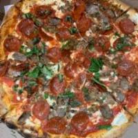 Meat Lovers Pizza  · Meatballs, pepperoni and sausage. Made with fresh house made mozzarella, Italian plum tomato...