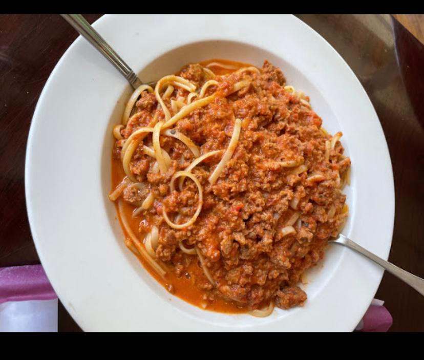 Pasta Bolognese · Served with choice of pasta. 
