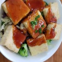 Tofu Bowl · Fried tofu with steamed veggies and rice
Teriyaki sauce