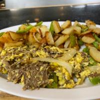 Breakfast Machaca & Eggs · Dried spiced meat. Choice of fried, scrambled, over easy, or sunny side up eggs.