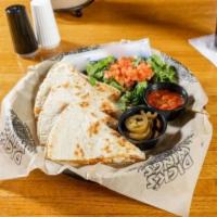 Dick's Ultimate Quesadilla · Grilled flour tortilla, grilled peppers and onions, and shredded cheddar jack cheese. Stuffe...