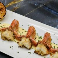 Jumbo Shrimp Alexander Appetizer · Four large sized shrimp coated with seasoned breadcrumbs with Beurre Blanc Sauce