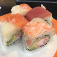 Rainbow Maki Roll · 4 pieces. Tuna, salmon and tilapia over California roll.