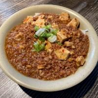 Mabo Don · Stir fried ground pork with tofu in a sweet and spicy sauce topped with green onions. Served...