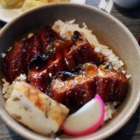 Unagi Don · Cooked freshwater eel with eel sauce. Served with rice and a small salad. 