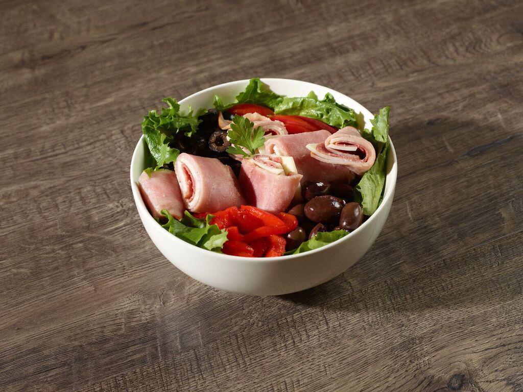 Chopped Antipasto Salad · Lettuce, salami, provolone cheese, tomatoes, Kalamata olives, black olives and roasted red peppers.