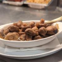 Sauteed Mushrooms · Fresh button mushrooms sauteed in white wine and spices.