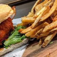 Buffalo Chicken Sandwich · Our panko crusted chicken breast tossed in our chef's house-made buffalo sauce and drizzled ...