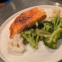 Salmon · Grilled salmon served with a medley of seasonal vegetables.