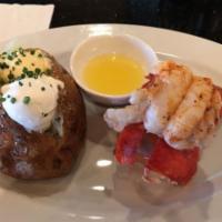 Lobster · Our 8oz. lobster tail steamed and served traditionally with butter and lemon.