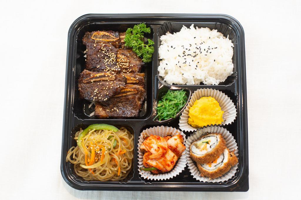 Meal Box B (Korean BBQ Short Ribs Combo) · Korean BBQ Short Ribs + Steamed Rice + Glass Noodles + Kimchi + Salad with Ranch Dressing + Dumplings