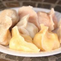 10. Assorted Boiled Dumplings · 2 pork, 2 vegetable, 2 chicken and 2 shrimp dumpling.