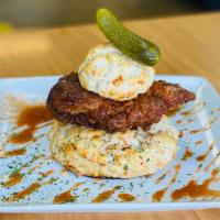 Fried Chicken n Giant Biscuit · 2 Juicy fried chicken breast on a buttermilk biscuit, house red pepper jelly, and pickles

