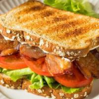 BLT Sandwich · 7 slices of Applewood smoked bacon, spring mix, tomato, mayo on sour dough