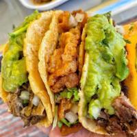 Buche Taco · Onion, cilantro and guacamole.