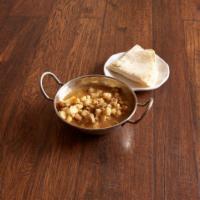 Evelyn's Bowl of Posole · Traditional New Mexico broth, cooked with New Mexico corn, (posole) dried New Mexico red chi...
