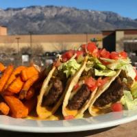 Emma's Taco Burger Plate · 3 crisp taco shells, with fresh Angus chuck ground steak, sliced American cheese, filled wit...
