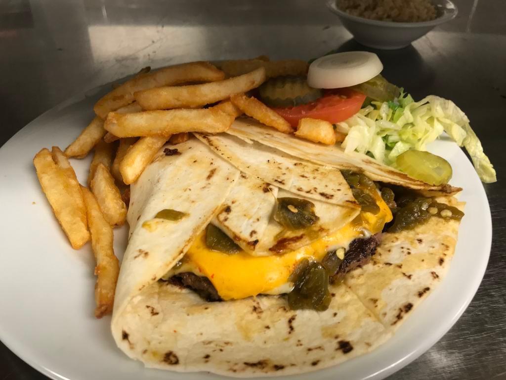Frankie's Tortilla Burger · Fresh Angus, chuck ground steak, served with 2 slices of American cheese, New Mexico red or green chile, on a flour tortilla.