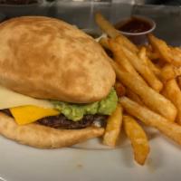 Arellana's Guaca Sopapilla Burger · Fresh Angus, chuck ground steak, served with 2 melted slices of American cheese, guacamole, ...