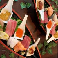 SASHIMI BOAT · Bluefin tuna, toro, yellowtail, salmon, albacore, jumbo scallop, salmon egg, snow crab, swee...
