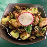 Brussels Sprouts · Sauteed Brussels sprouts with shoyu-koji and garlic chip.