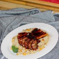 Roast Pork and Smoked Eel Over Fried Rice · Mild sweet meat that has been roasted. Stir fried.