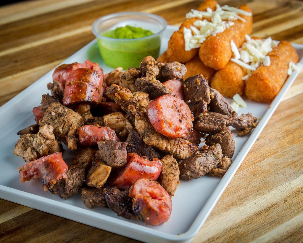 Parrilla · Steak, chicken, sausage, fried yucca and specialty sauces.