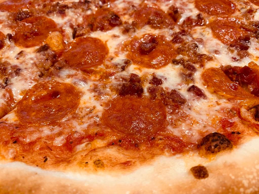 Pepperoni and Bacon Pizza · Marinara sauce, mozzarella cheese, pepperoni and bacon.
