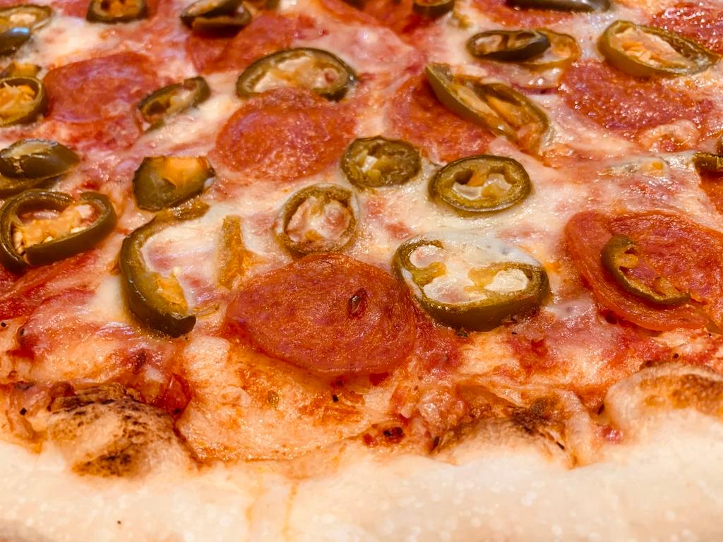 Pepperoni and Jalapenos Pizza · Marinara sauce, mozzarella cheese, pepperoni and jalapenos.