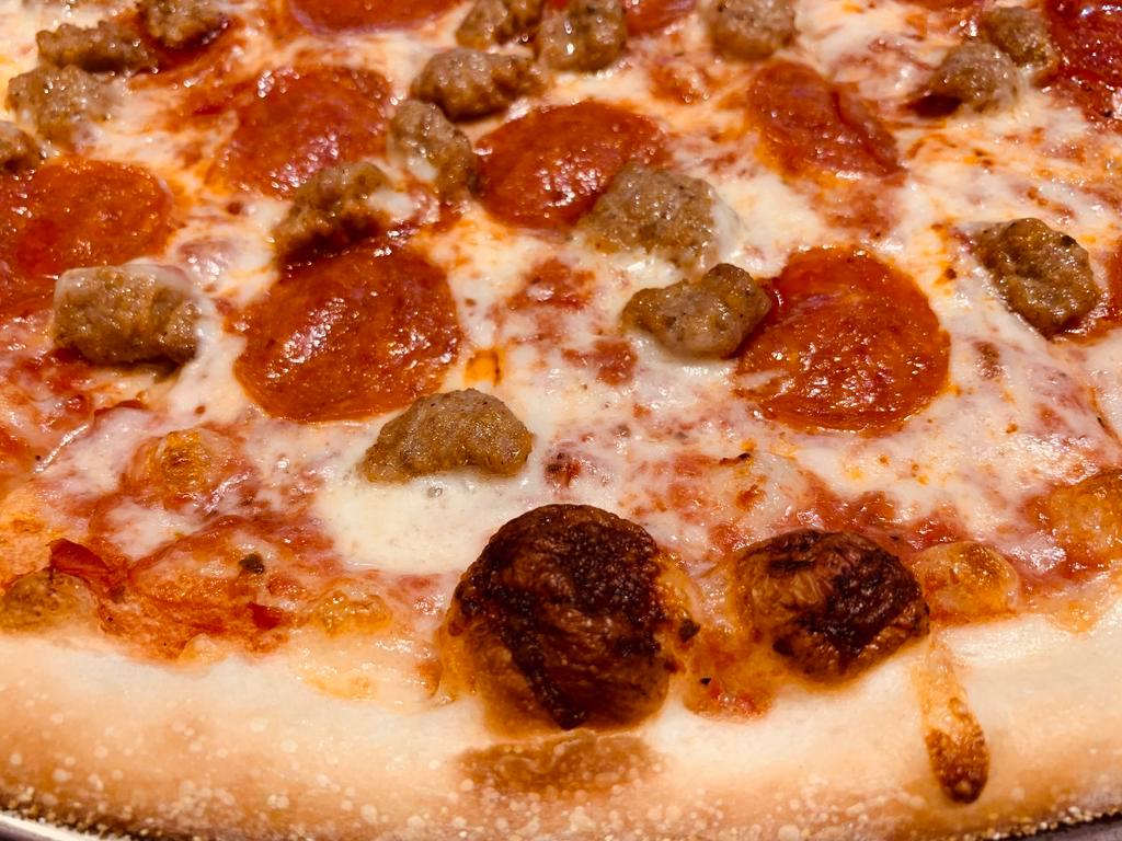 Pepperoni and Sausage Pizza · Marinara sauce, mozzarella cheese, pepperoni and sausage.