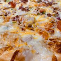 Chicken Bacon Ranch Pizza · Ranch, mozzarella cheese, chicken, bacon, diced tomatoes, green onion and Monterey Jack chee...