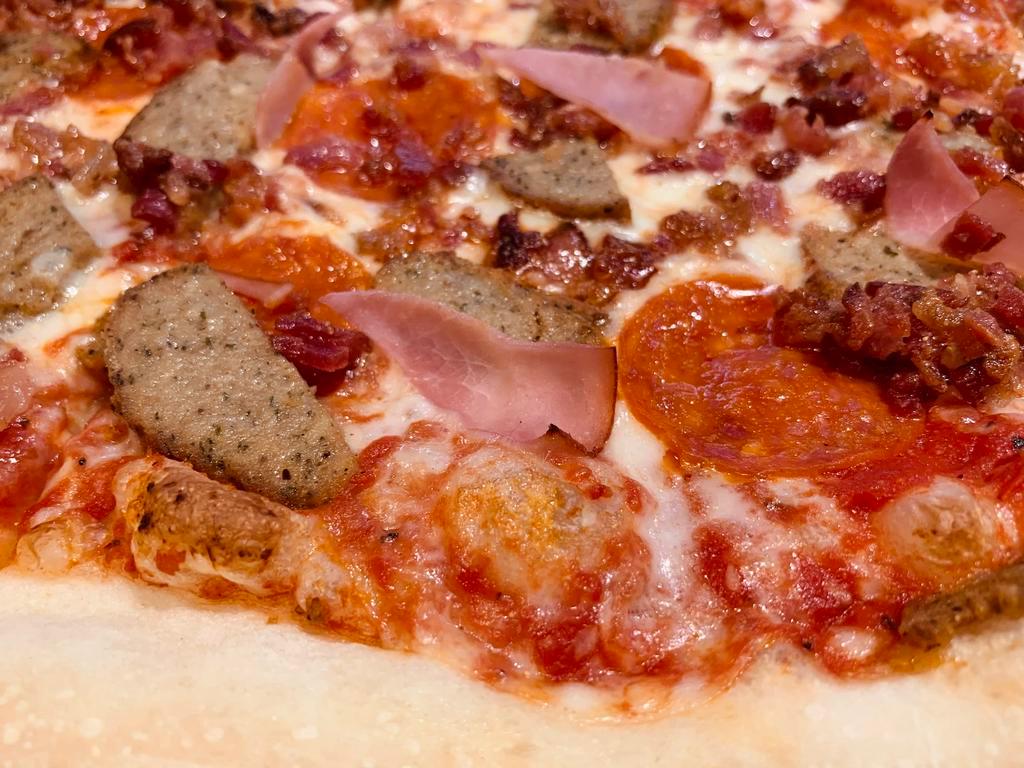 Meatlovers Pizza · Marinara sauce, mozzarella cheese, pepperoni, bacon, ham and meatballs.