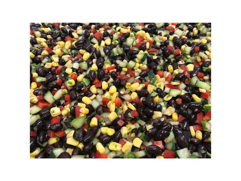 Black Bean Corn Salad · Black beans, refreshing cucumber, corn and red bell peppers tossed in Chanos' jalapeno vinaigrette. Vegetarian. Gluten free.
