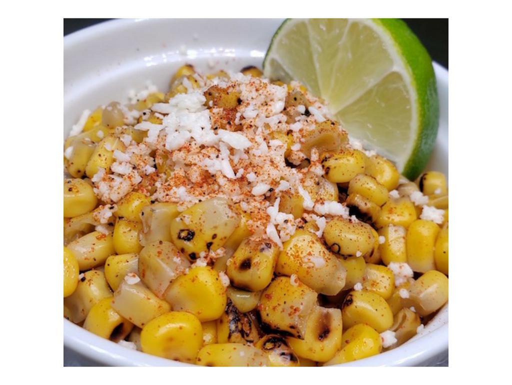 Esquites · Mexican street corn cups. Smoky, sweet, spicy and tangy charred corn off the cob slathered with a creamy, cheesy lime-scented chili flecked sauce. Vegetarian. Gluten free.