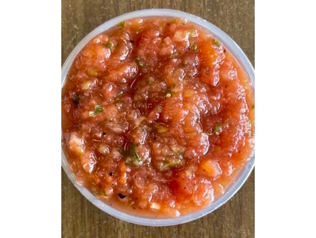 House Salsa · Mild, fresh and crisp simply addictive fire roasted ripe tomatoes, onion, garlic and a touch of fresh jalapeno and cilantro. Dairy Free. 
