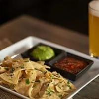 Chips & Guacamole · Corn tortilla chips topped with fresh cilantro, sides of guacamole and roasted tomato salsa.