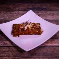 Beef Enchiladas · Topped with ancho chile sauce and mix cheese.