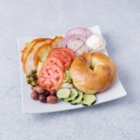 Smoked Sable Platter · Served with lettuce, tomato, Bermuda onion, bagel and a side of plain or scallion cream chee...