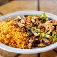 8. Fiesta Chicken Breast · Served with lime and tequila sauce, topped with melted cheese. Served with rice, beans, lett...