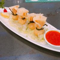 A4. Crab Rangoon · 4 pieces. Deep-fried dumpling with crab meat and cream cheese.