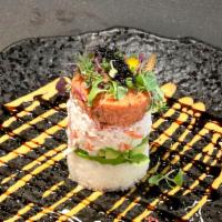 CA1. Ahi Tower · Blue fin tuna or salmon, avocado, crab meat and sushi rice. Served with eel sauce and spicy ...