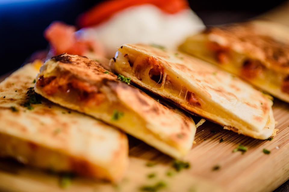 Grilled Shrimp Quesadilla · Large flour tortilla stuffed with onions, peppers, pico de gallo, Shrimp and Cheese.