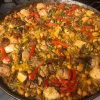 Arroz con Pollo Special · Per person. Prepared just like a paella but without seafood, just our tender chicken breast....