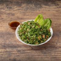 Tabboule Salad · Chopped parsley, mint, bulgur, tomato, onion and lemon dressing.